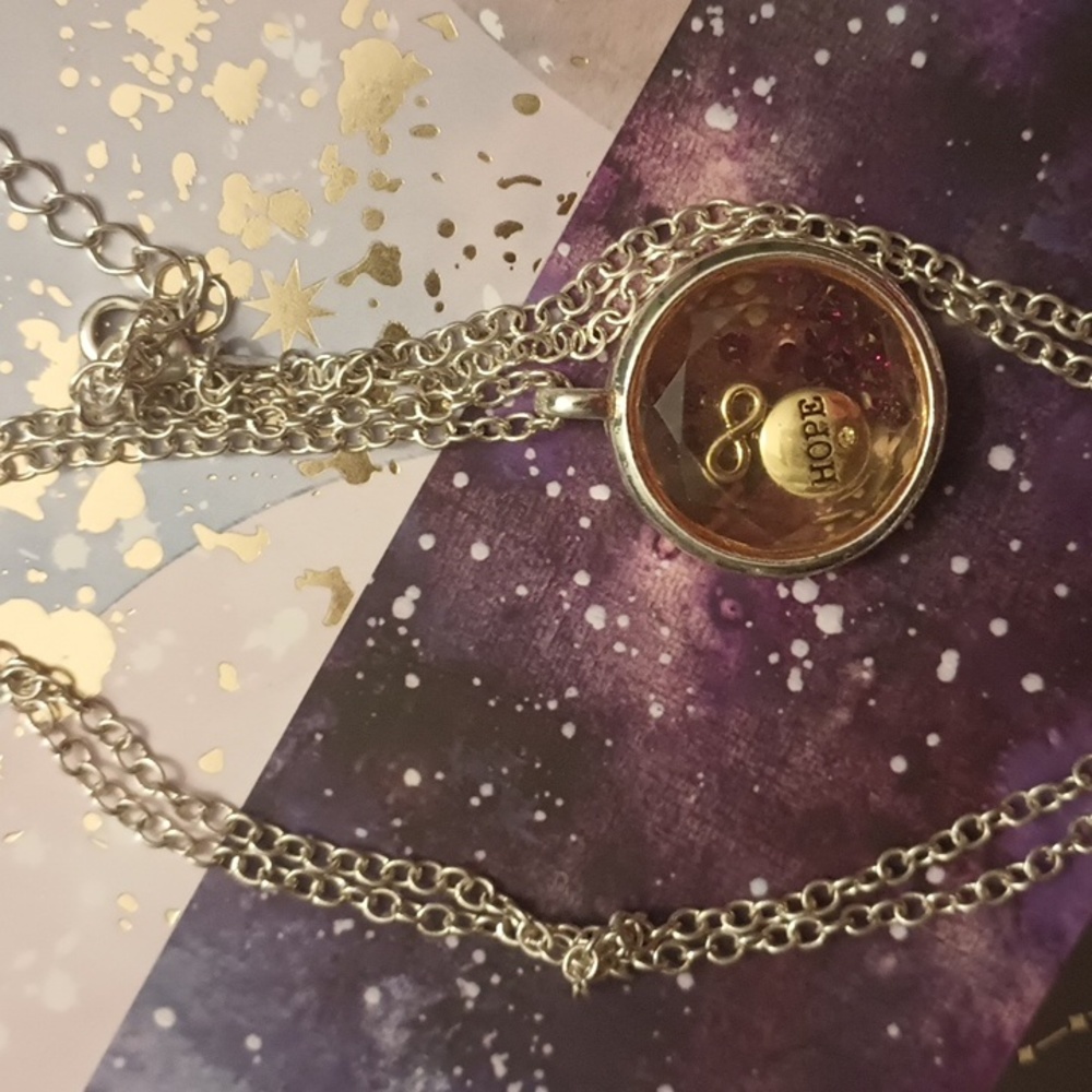 INFINITY, CHARMS FLOATS W IN ROUND GLASS CHARM